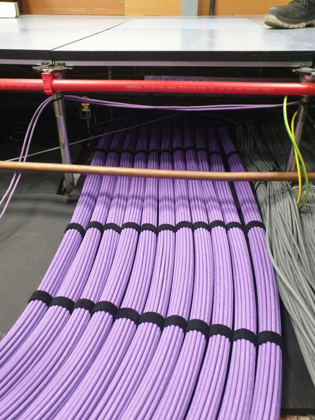 Neatly bundled data cables in a data center